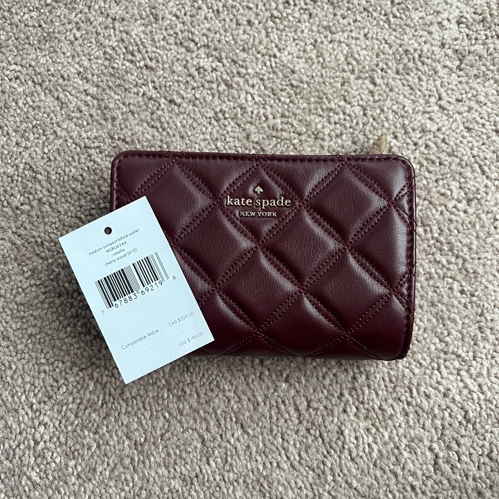 $110 OBO!!! Kate Spade Natalia bifold wallet in burgundy color “cherry wood”